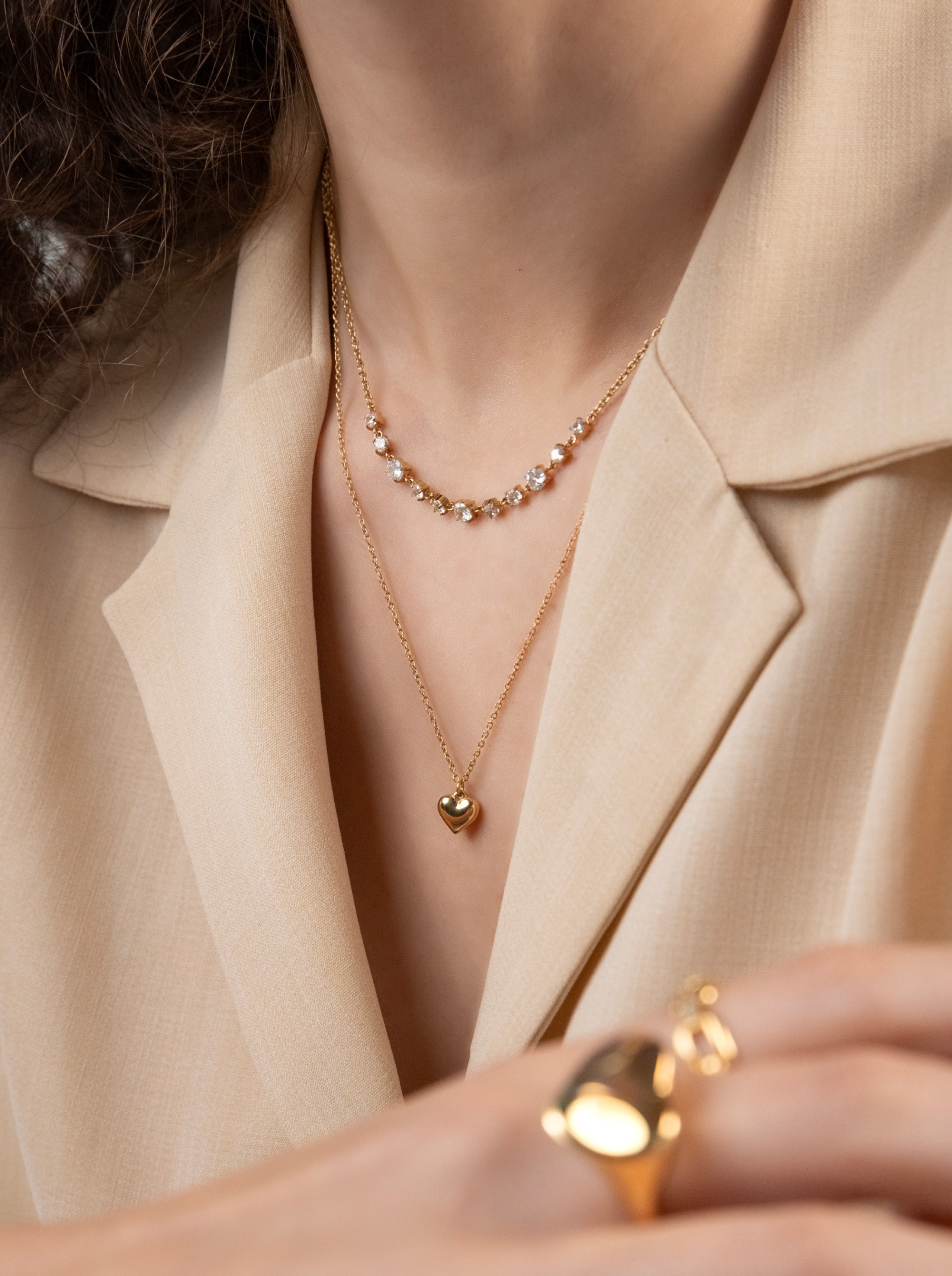 Halskettingen ONE Neckmess Heart Gold